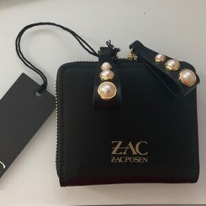 ZAC POSEN EARTHA LEATHER MINI WALLET. BLACK. DUAL ZIPPER THAT’S ADORNED IN PEARL